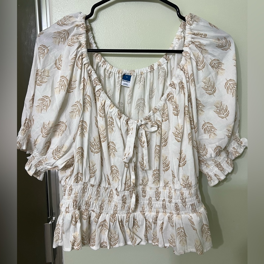 White and gold plume top